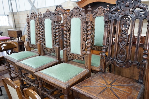 A set of six 19th century Carolean style carved oak dining chairs and one other similar chair (7)